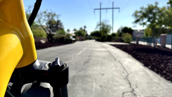 Bike trail from the perspective of a bike fork